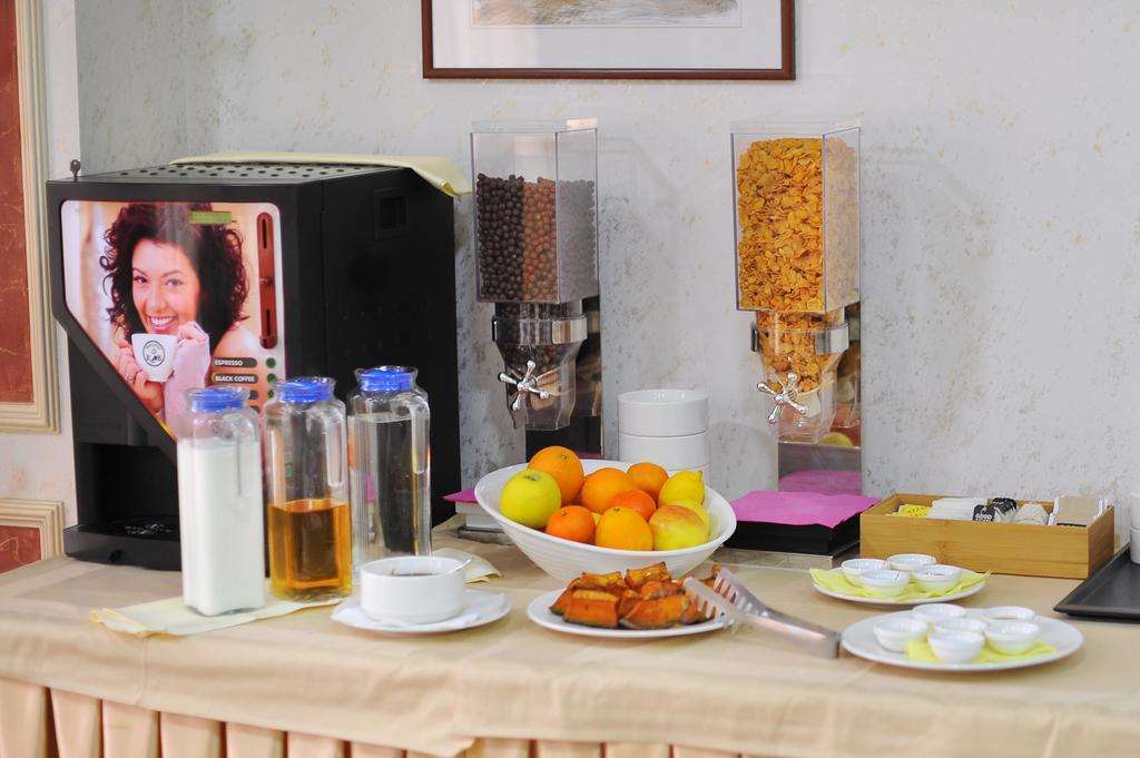 Hotel Gold سكوبجي المطعم الصورة